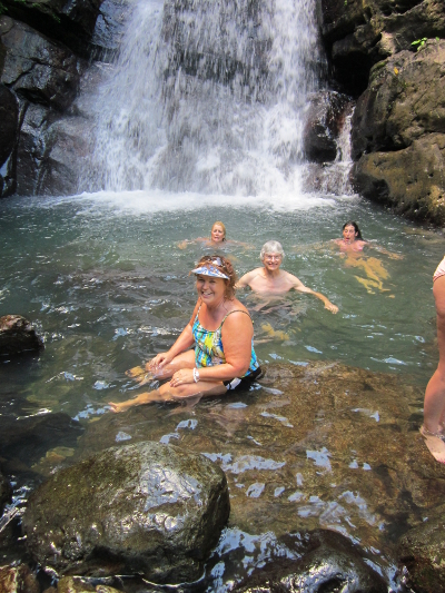 Ellen and Steve enjoy the pool below La Mina Falls