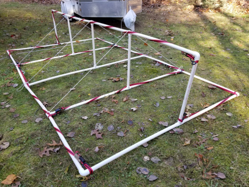 Frame reinforced using racheting straps and nylon line