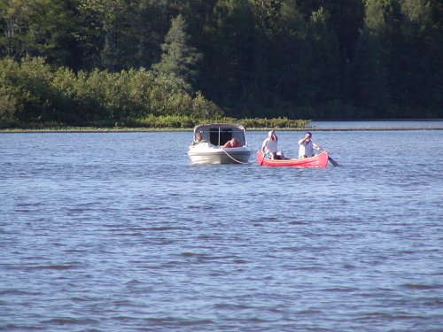 Canoe pulling boat